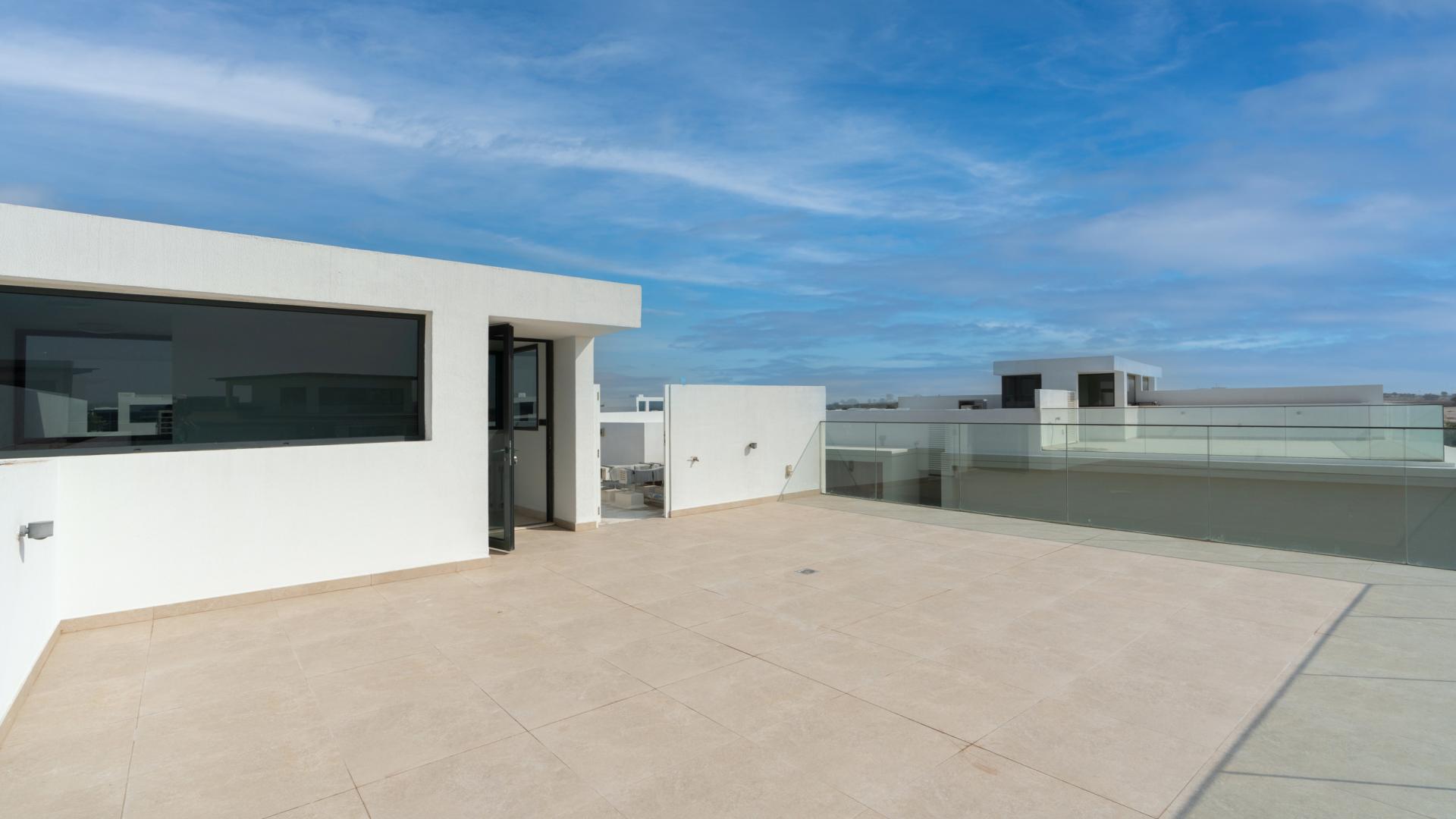 Modern living and dining area in Golf Grove villa, Dubai Hills Estate, featuring stylish decor