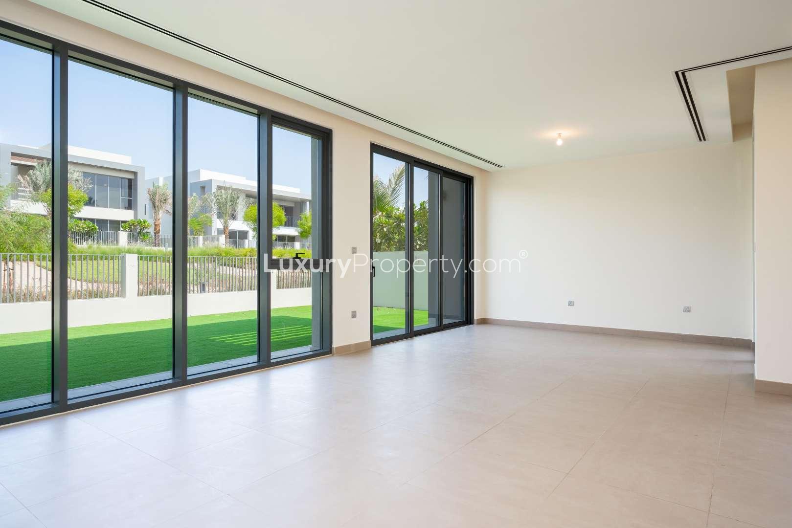 Bright living room with large windows in Dubai Hills Estate villa for rent