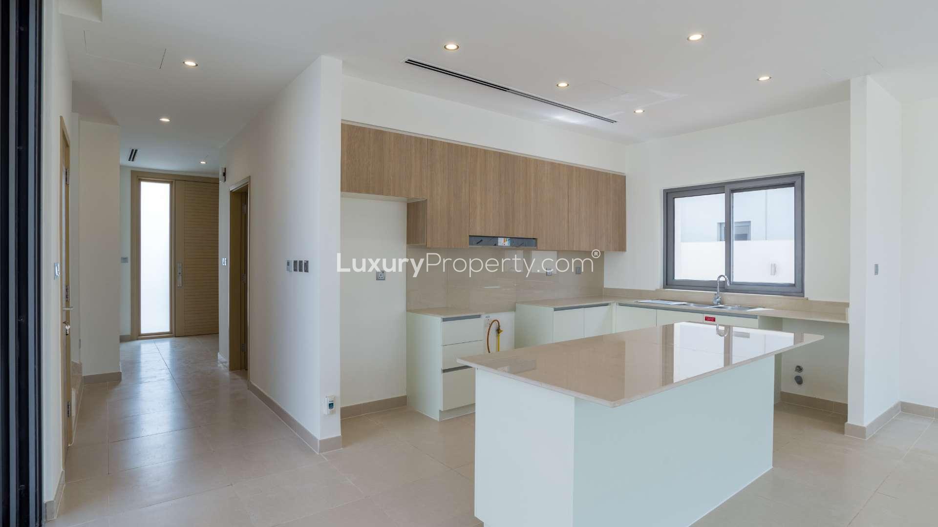 Balcony view of Sidra Villas in Dubai Hills Estate, showcasing modern architecture and greenery