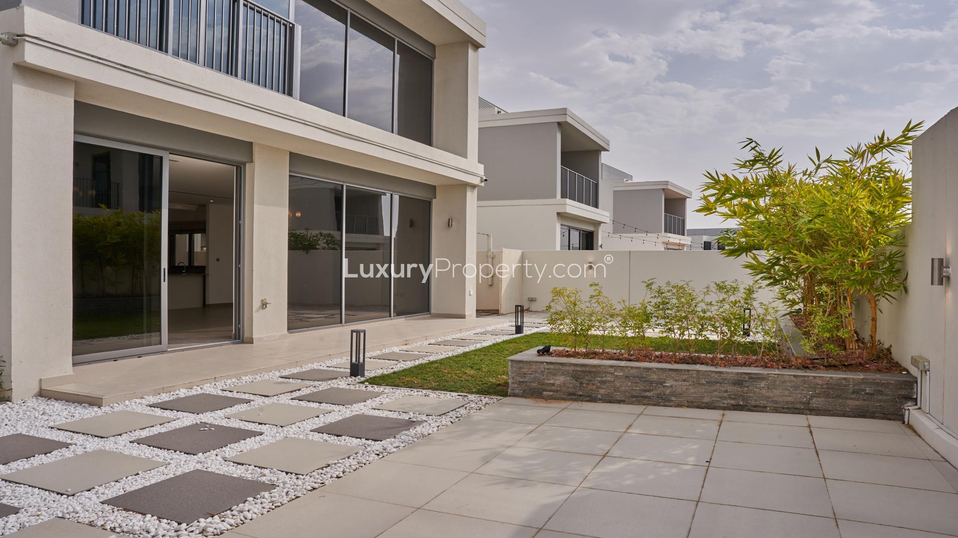 Upgraded 4-bedroom villa garden path in Sidra Villas, Dubai Hills Estate for rent