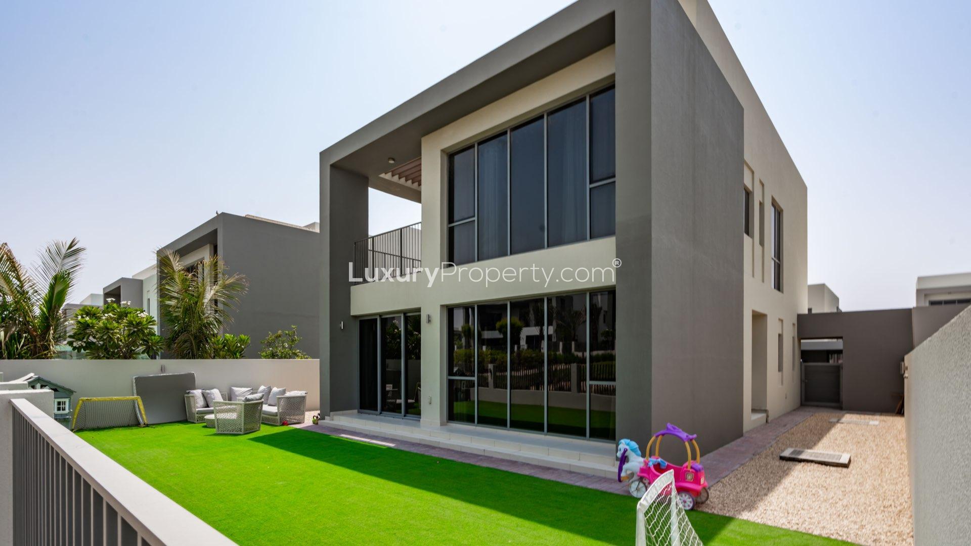 Spacious living area with modern kitchen in Sidra, Dubai Hills Estate villa for rent