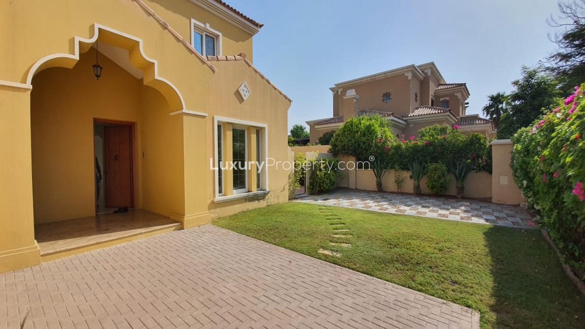 Empty living room in Mirador La Coleccion villa, Arabian Ranches, with large windows and tiles