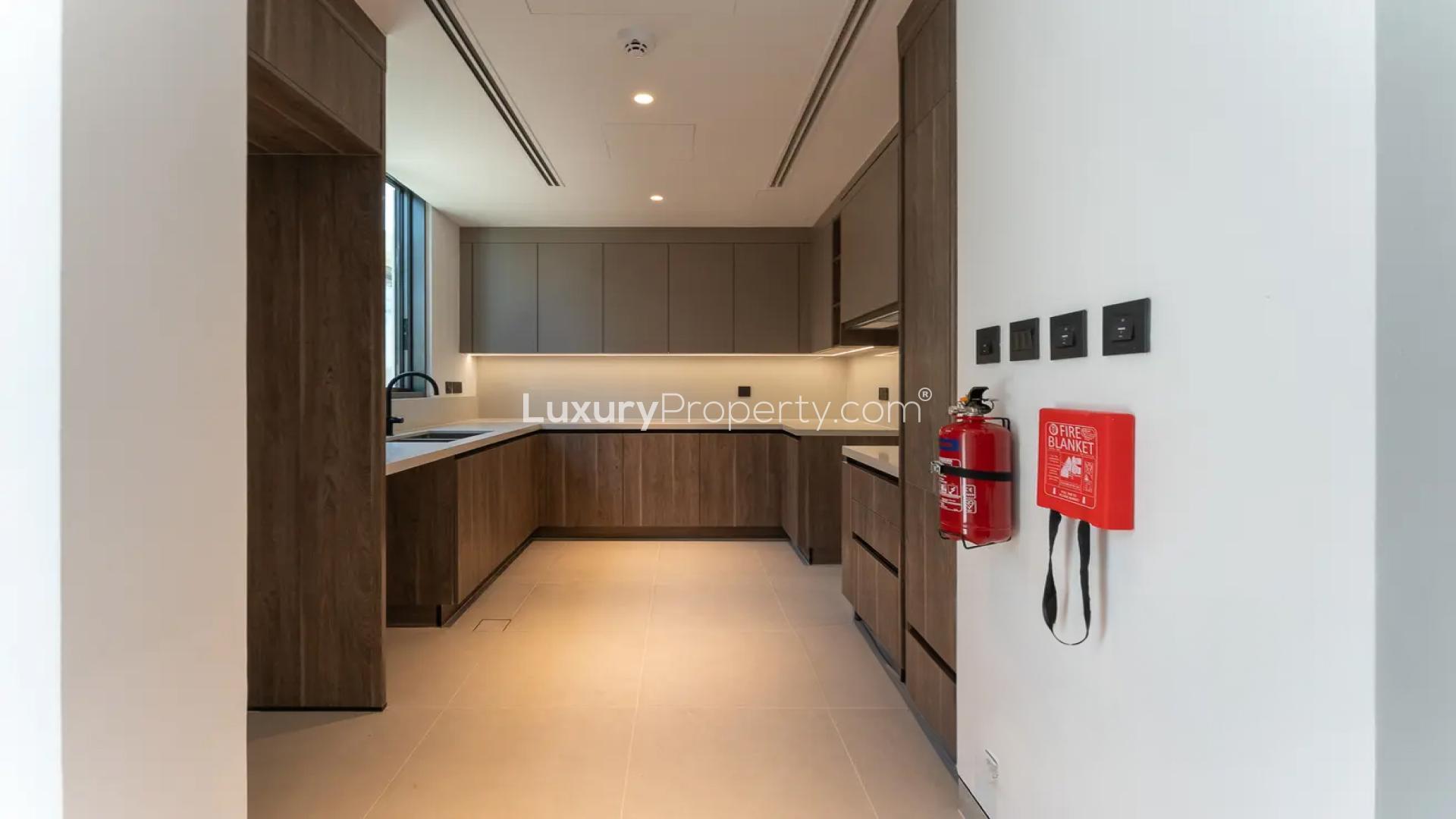 Contemporary spacious villa interior with large windows in Harmony, Tilal Al Ghaf