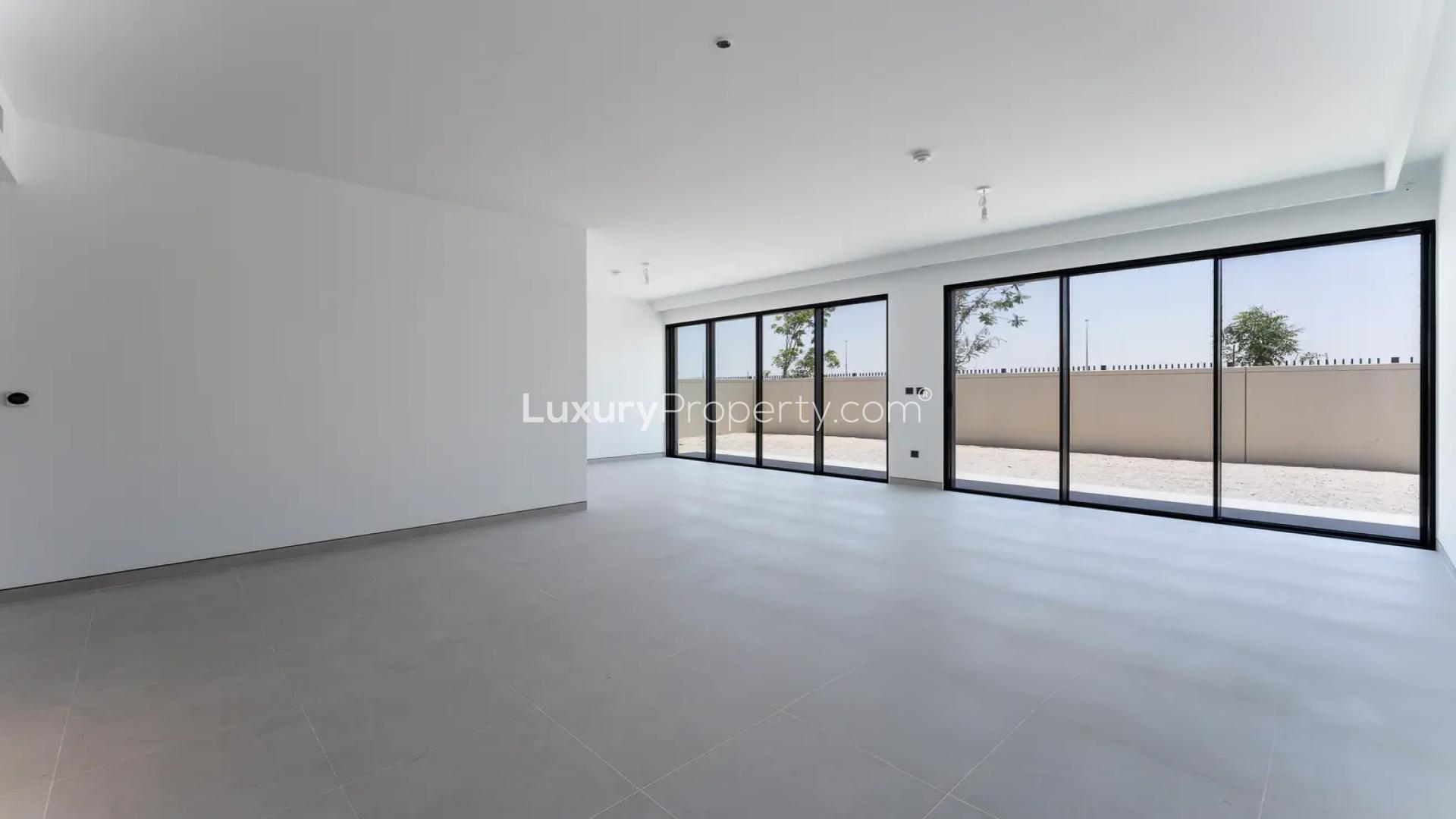 Spacious living area in contemporary Tilal Al Ghaf villa, Harmony community, available for rent