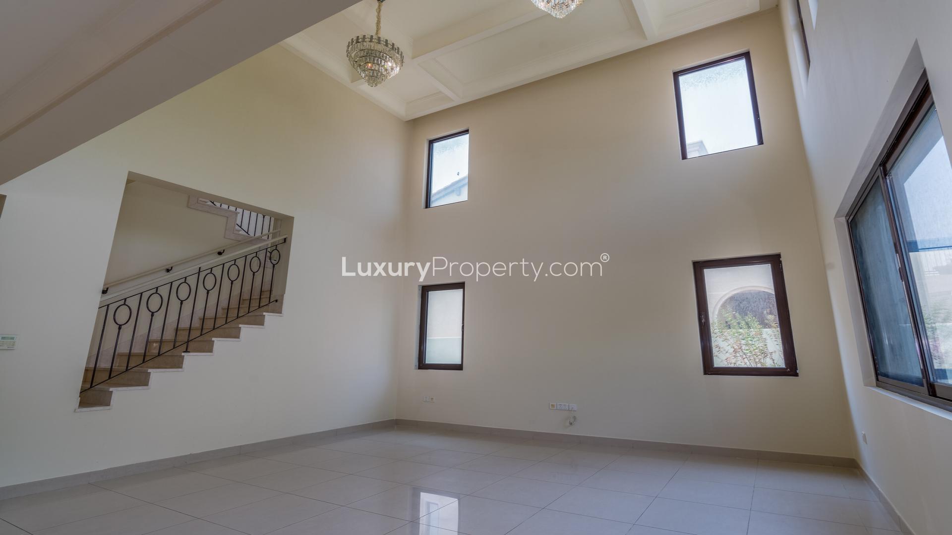 Contemporary 4-bedroom villa exterior in Rosa, Arabian Ranches 2, with landscaped garden