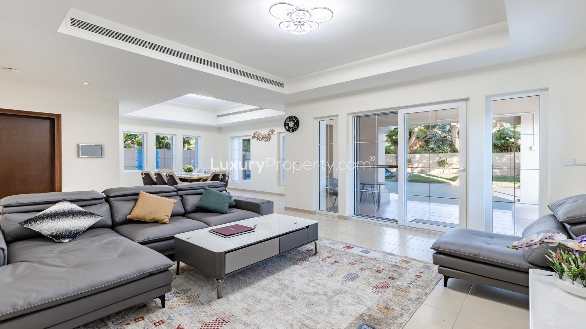 Alvorada Villa exterior with driveway in Arabian Ranches, available for rent