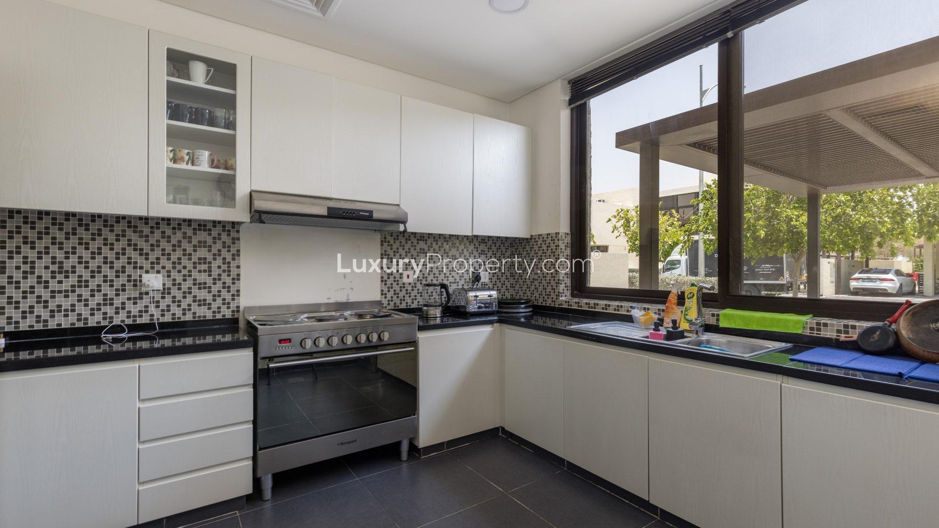 Gorgeous 4-bedroom villa exterior with patio in The Turf, Damac Hills, for rent