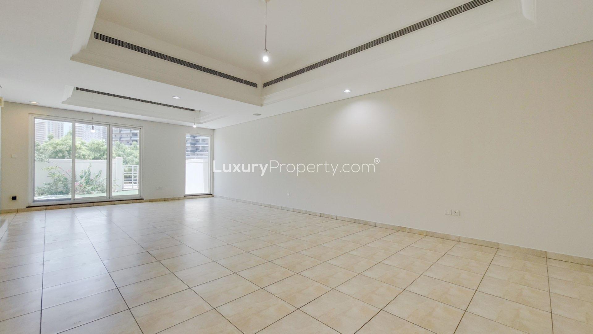 Landscaped garden view of 4-bedroom villa in Victory Heights, Dubai Sports City for rent