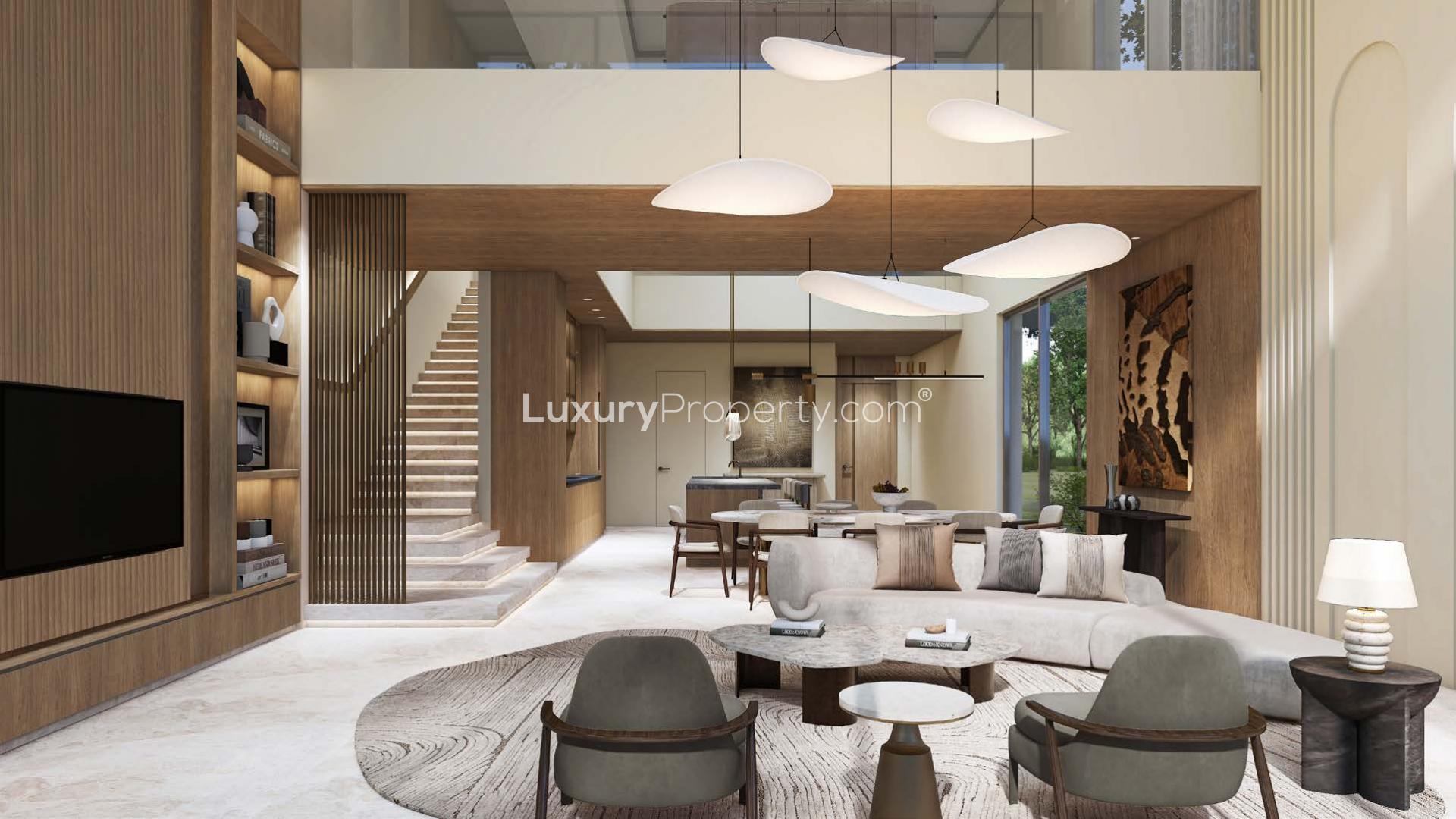 Modern villa exterior with lush garden and pool in Tilal Al Ghaf, Plagette32