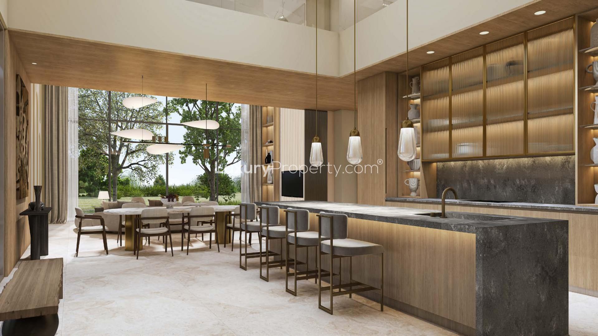 Modern corner villa in Tilal Al Ghaf community with lush landscaping and sleek architecture