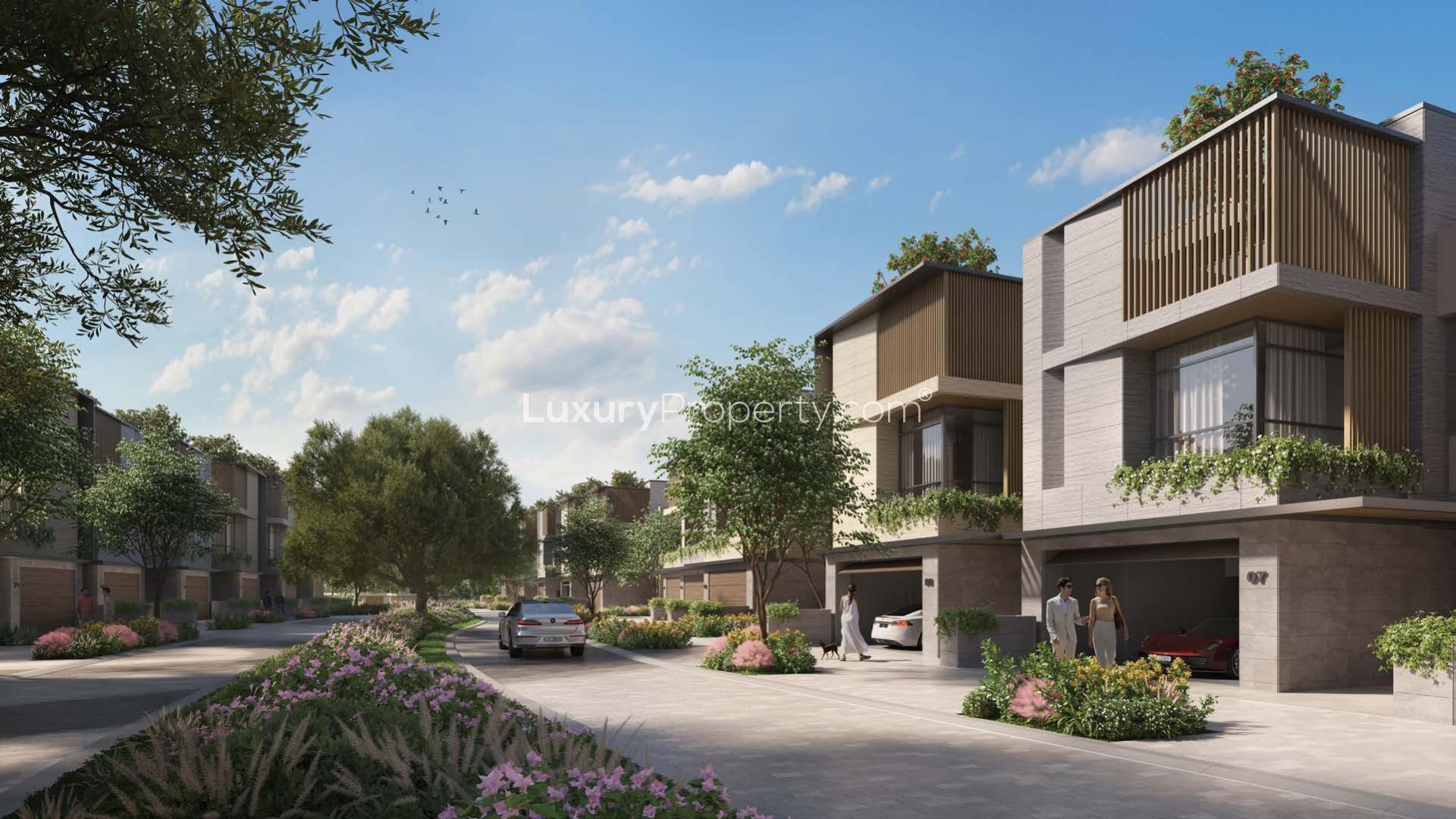 Luxurious kitchen and dining area in French-inspired villa, Tilal Al Ghaf, for sale