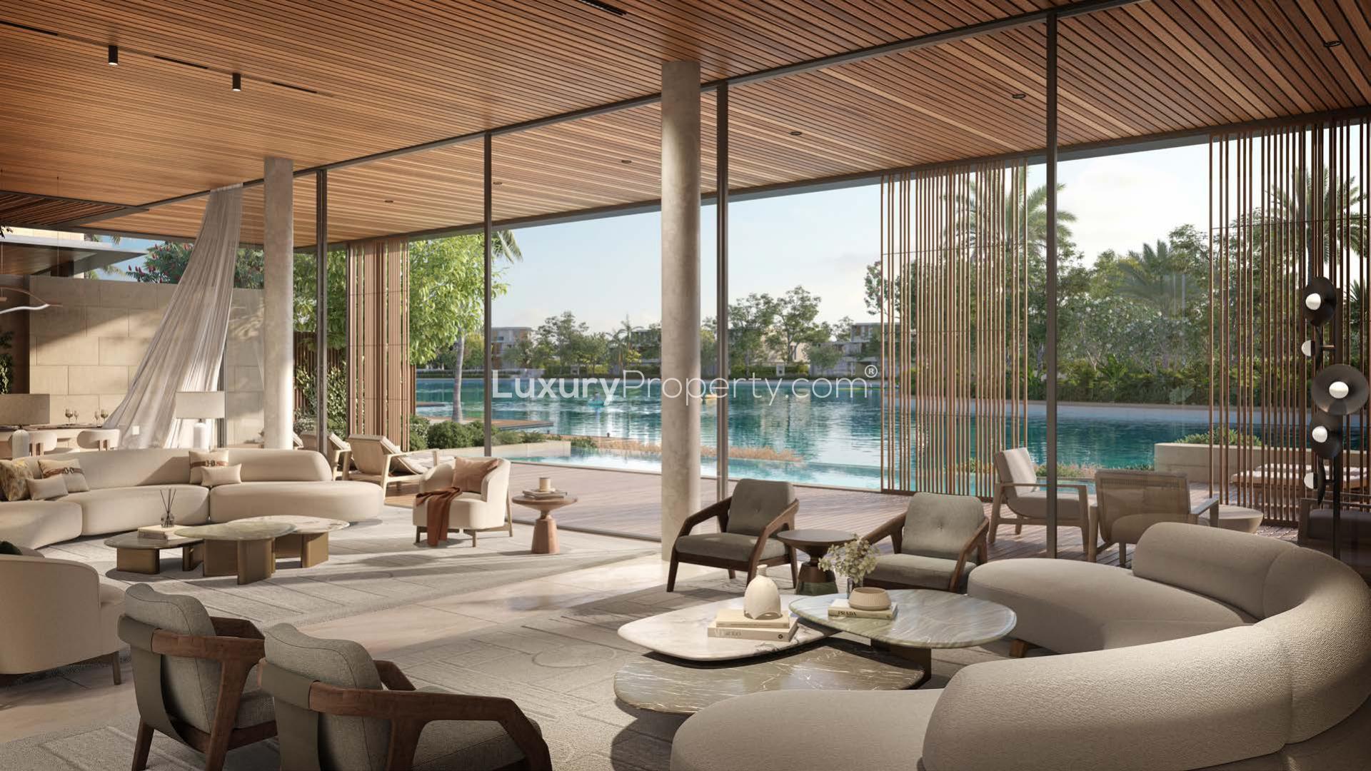 Luxurious villa with pool and waterfront view in Tilal Al Ghaf, Plagette 32