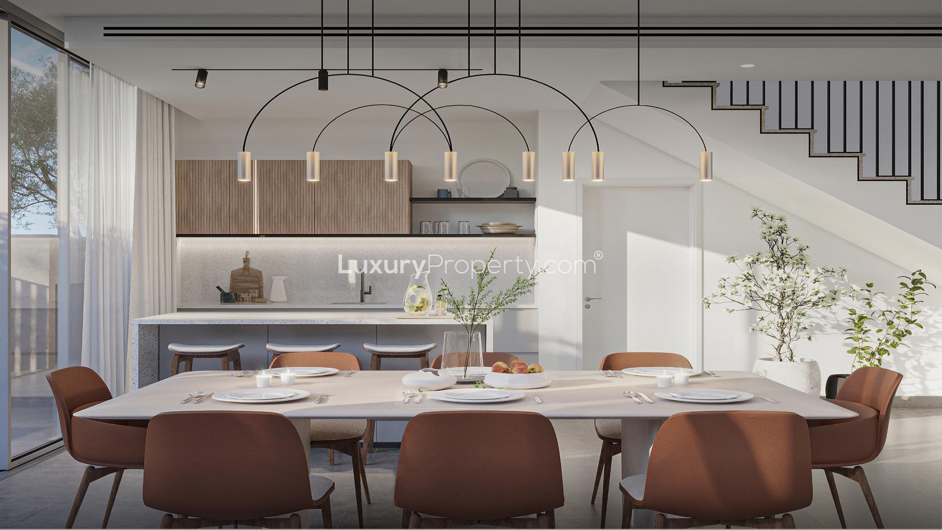 Modern dining area in exclusive Arabian Ranches 3 villa, featuring elegant decor and natural light