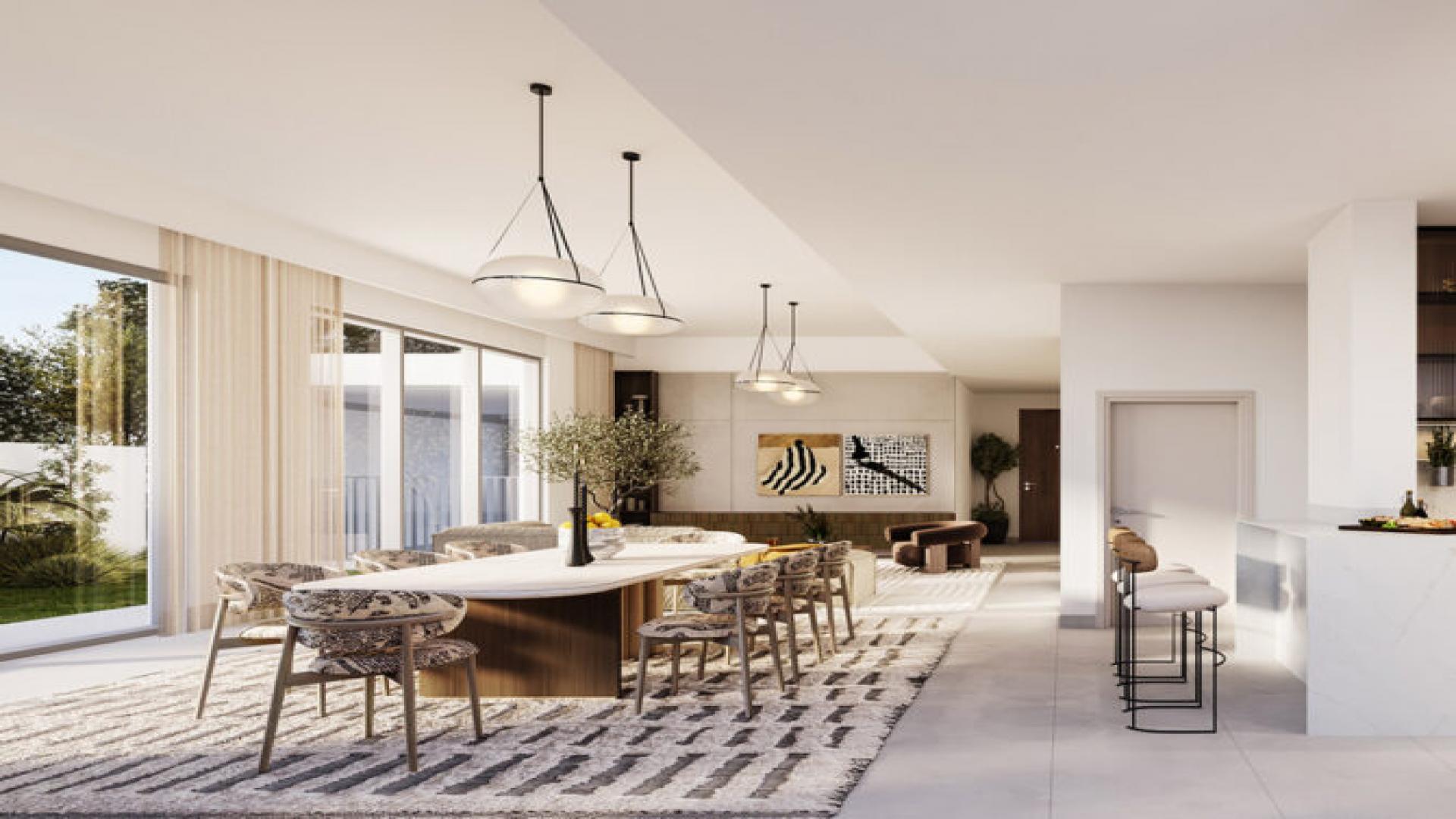 Elegant 4-bedroom villa exterior with garden in Emaar South, Fairway Villas 3