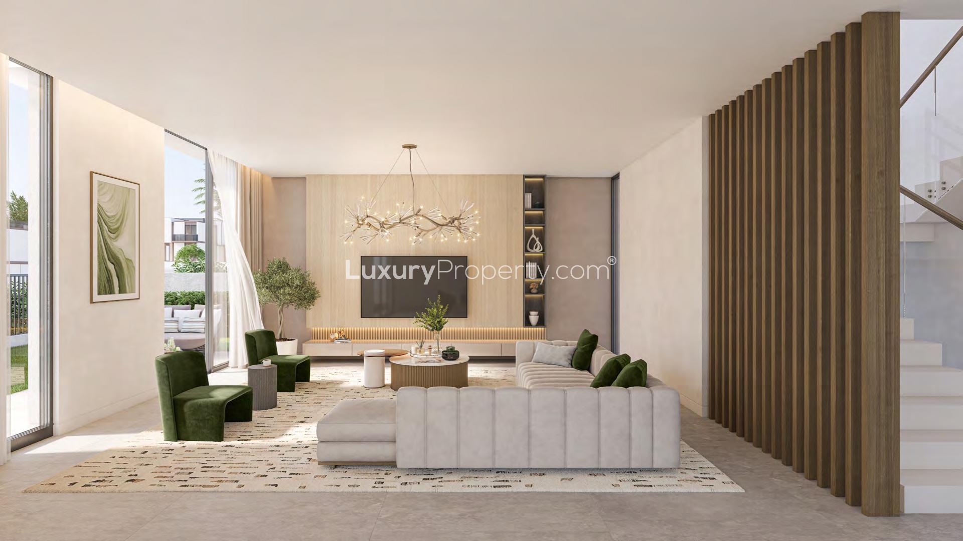 Elegant 4-bedroom villa exterior with garden and carport in Athlon, Dubai Land for sale