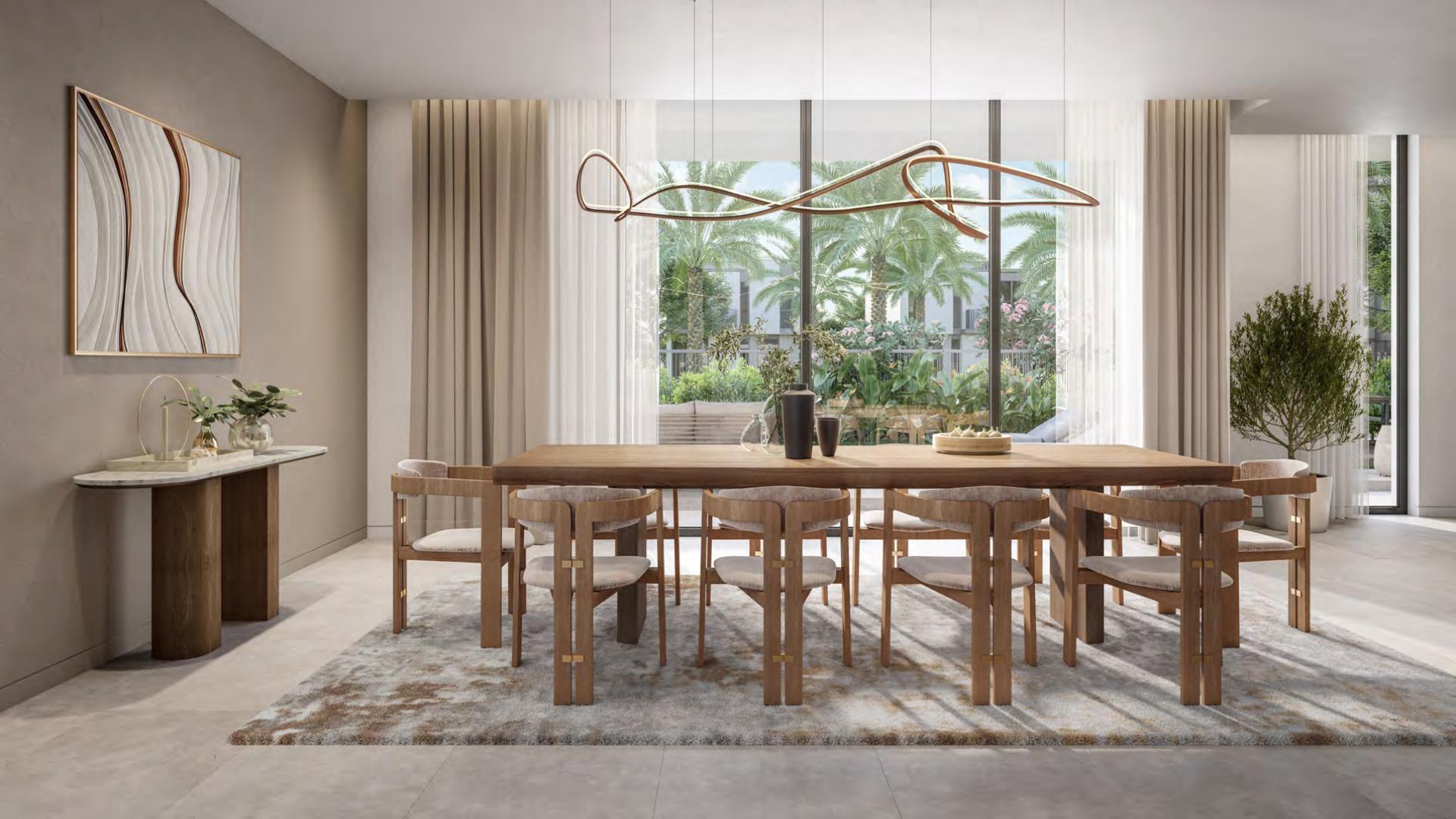 Elegant 4-bedroom villa exterior in Athlon, Dubai Land, featuring modern design and lush garden