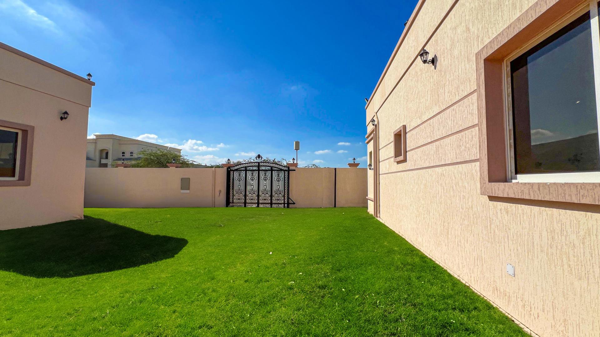 Spacious, sunlit room with marble flooring in Al Riffa villa for sale, RAK