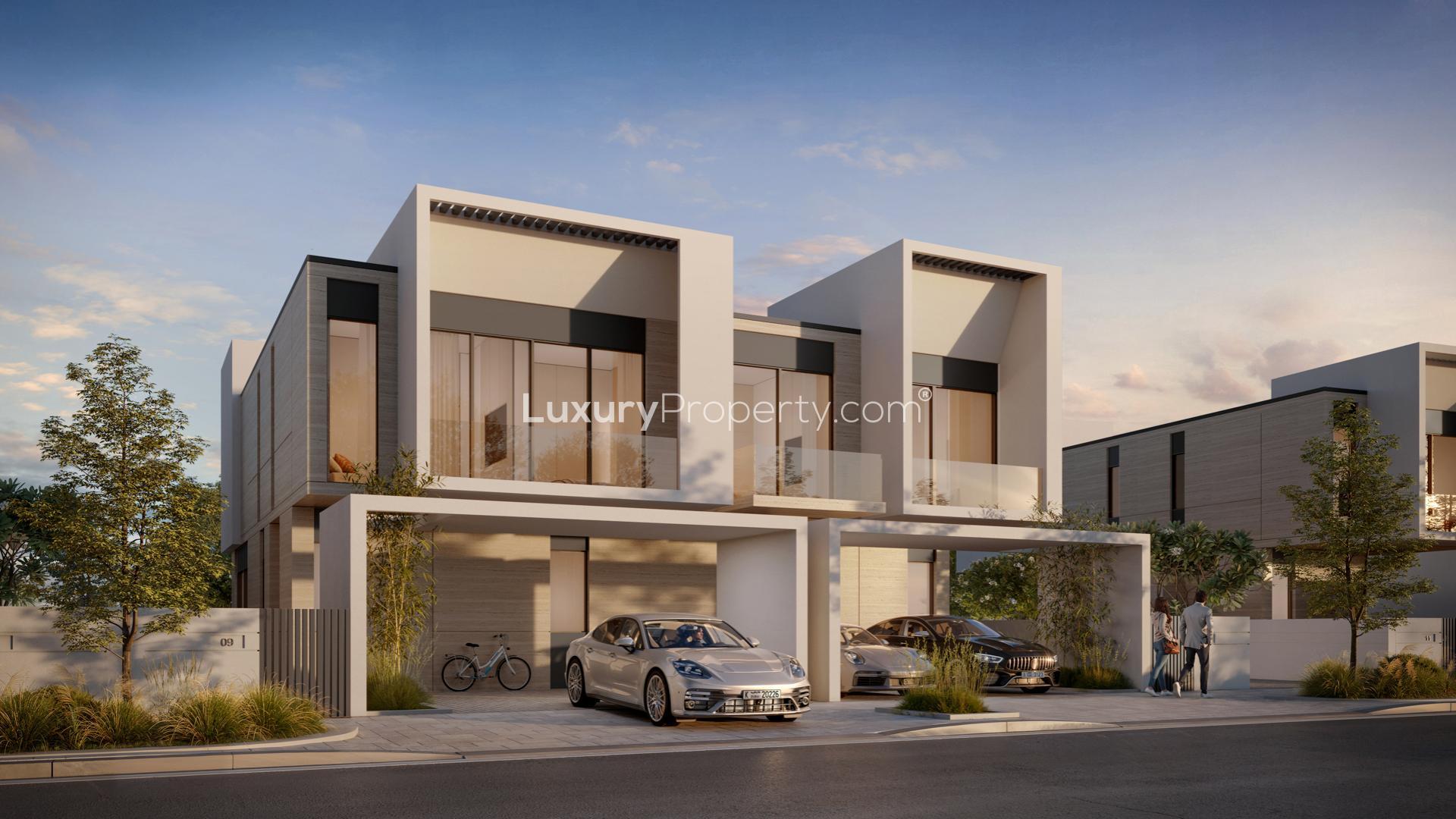 Luxurious living room in DG Villas, Jumeirah Golf Estates with modern decor and garden view