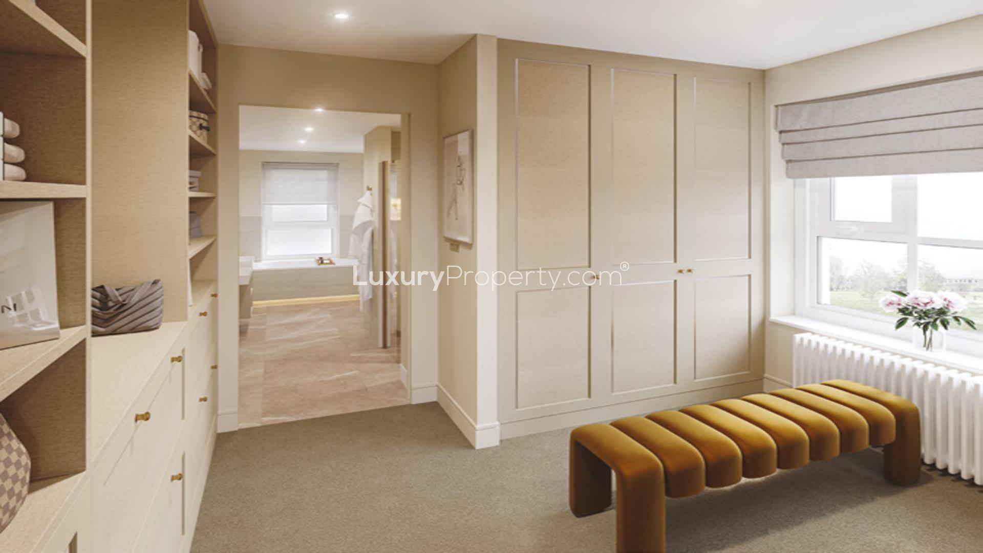 Elegant bedroom in spacious villa, London Square Wandsworth Common, featuring modern decor and balcony