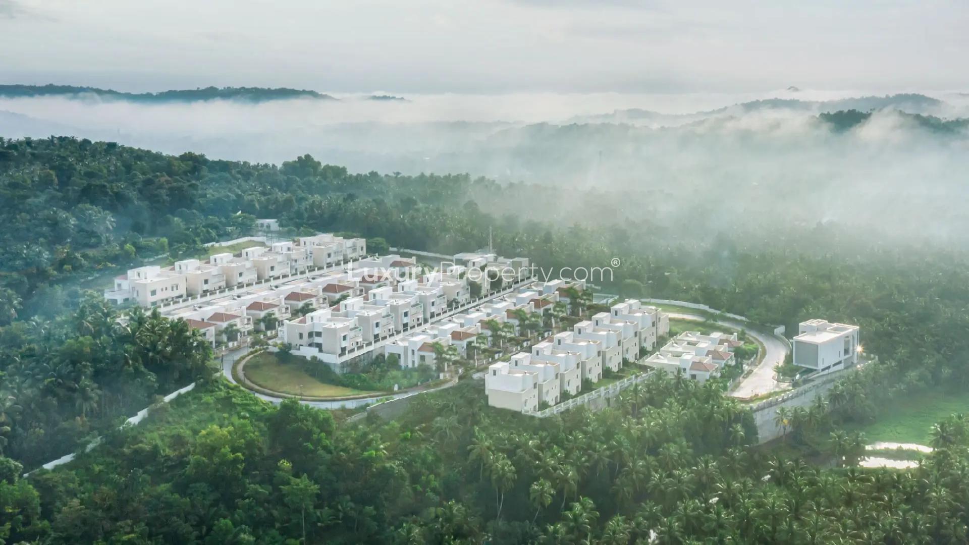 Aerial view of premium gated villas in Velliparamba