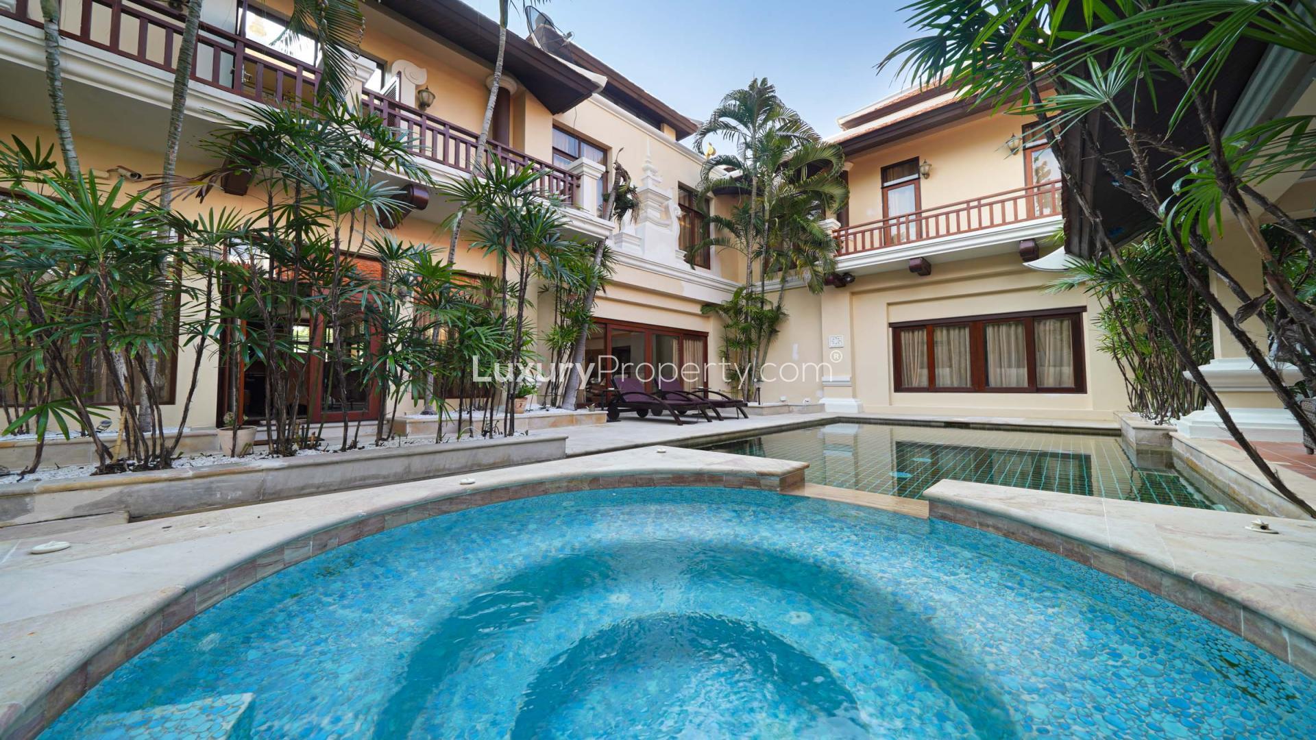 Front entrance of luxury villa with water feature in Viewtalay Marina, Pattaya