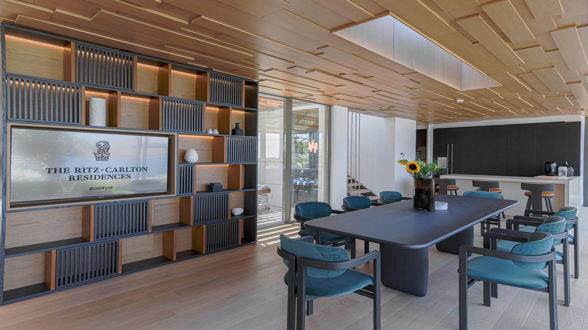 Courtyard Villa at Ritz-Carlton Bodrum, modern architecture, lush garden, outdoor seating area