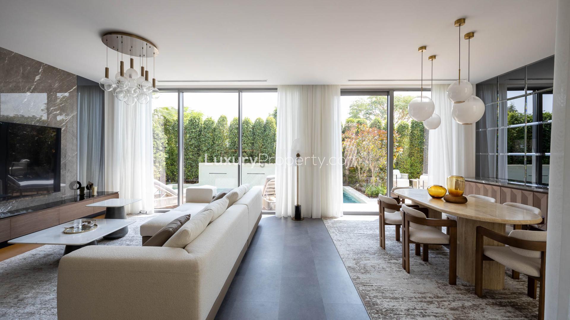 Luxurious living room in upgraded Sidra III villa with pool view, Dubai Hills Estate