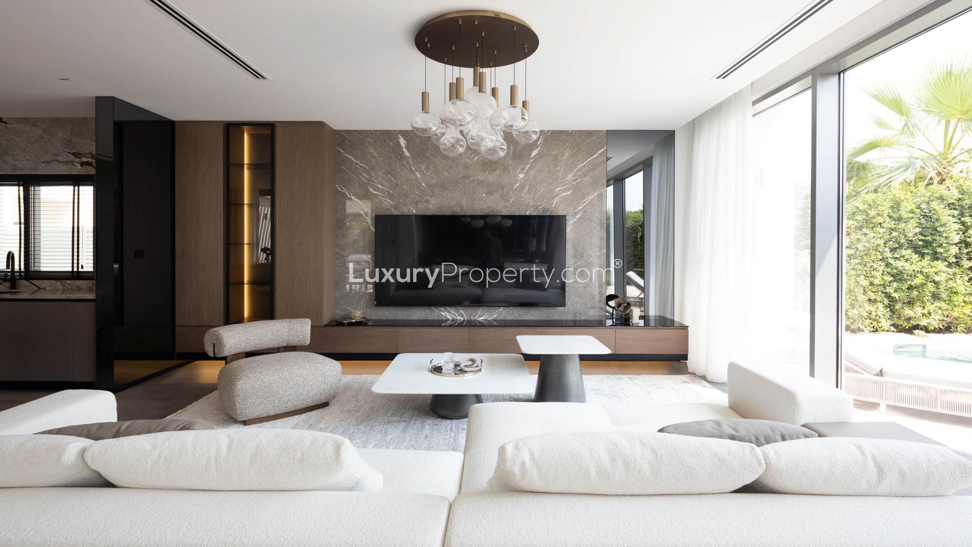 Modern living room in Sidra III villa, Dubai Hills Estate, featuring sleek design elements
