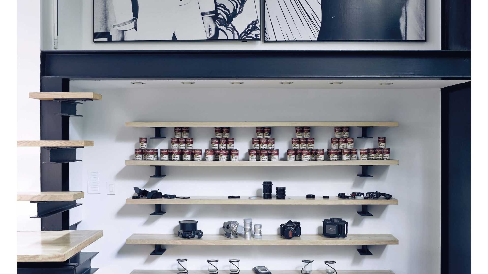 Shelving unit with art, cameras, and cans in Manhattan townhouse, 101 East 63rd Street
