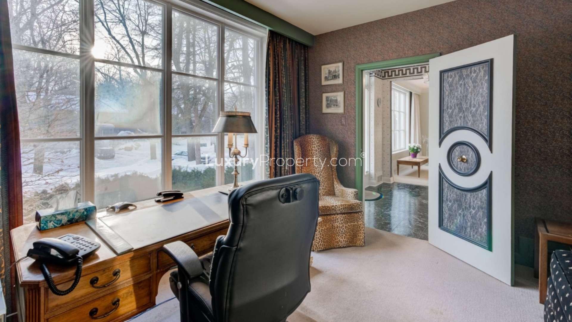 Dining area with floral wallpaper in York Mills villa, overlooking snowy backyard