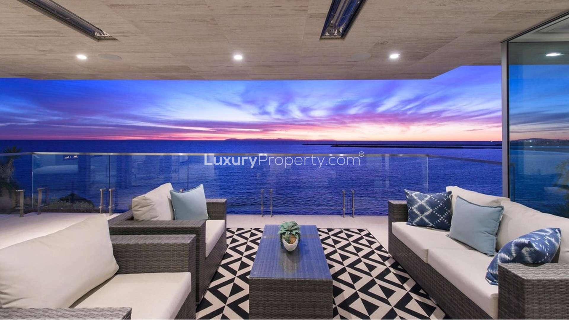 Ocean view patio with seating at 4-bedroom villa, 3725 Ocean Boulevard, Corona Del Mar