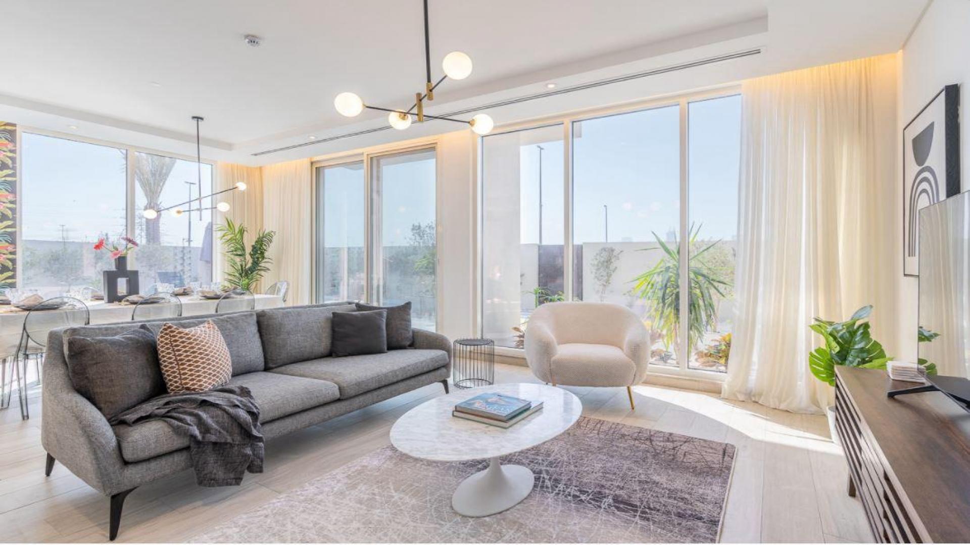Modern living room in luxurious Jumeirah Park villa with stylish decor and natural light