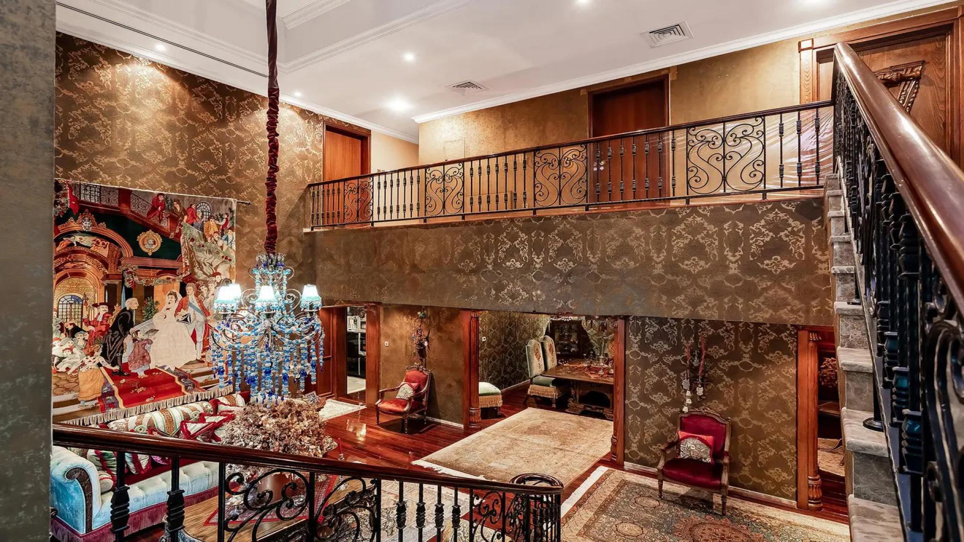 Luxurious 4-bedroom villa exterior in Jumeirah Islands, Cluster 32, with lush landscaping