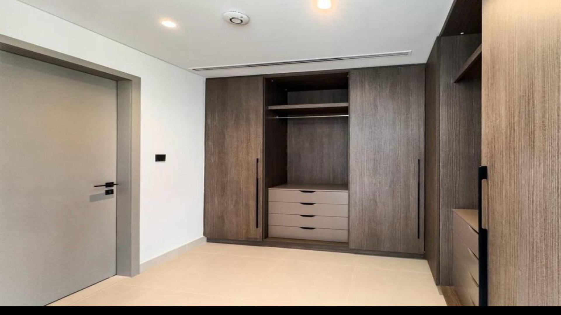 N/A,Modern built-in wardrobe in 4-bedroom Aura Villa, Tilal Al Ghaf, for sale