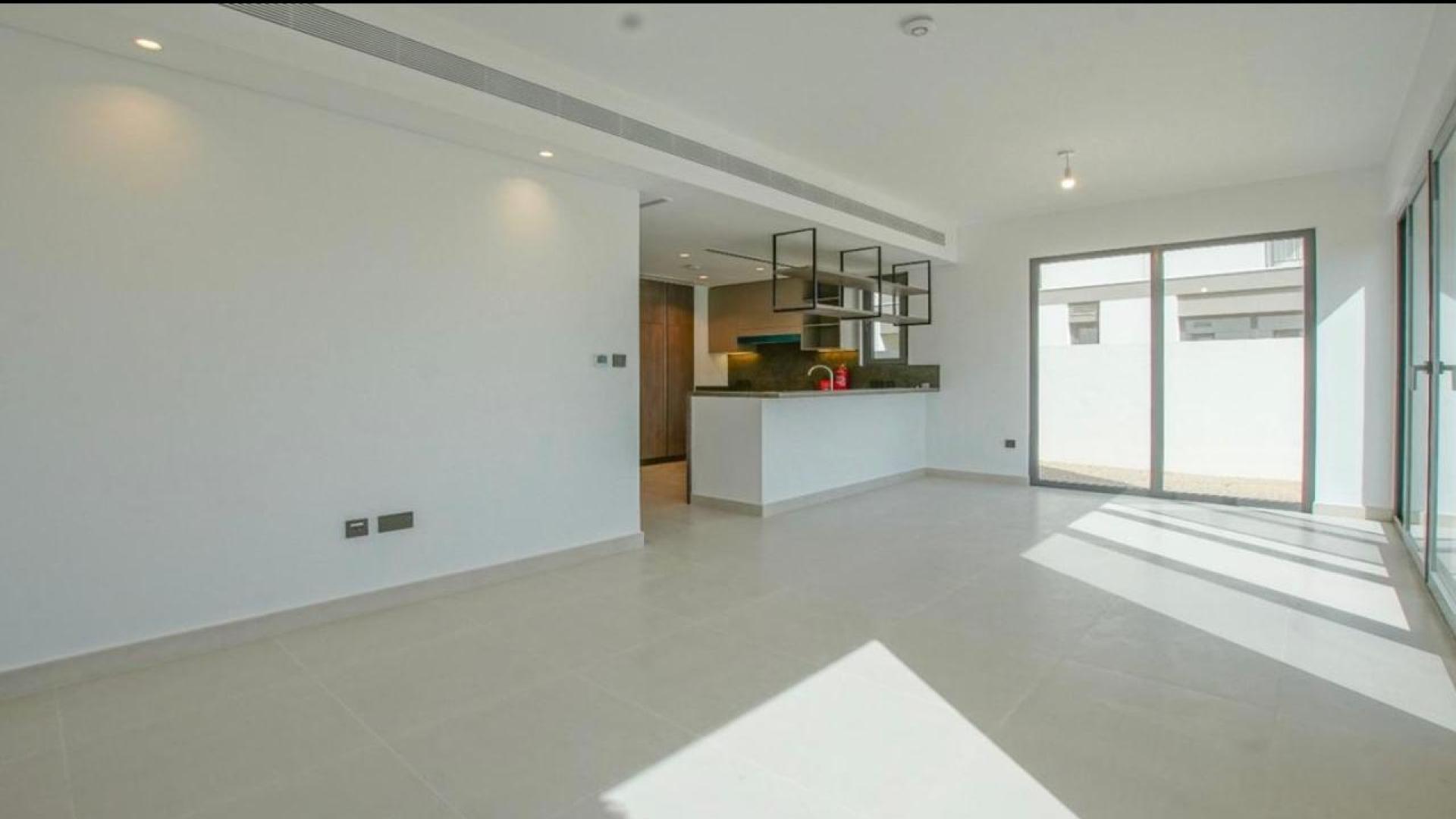 Exterior view of 4-bedroom Aura Villa in Tilal Al Ghaf with private garden space