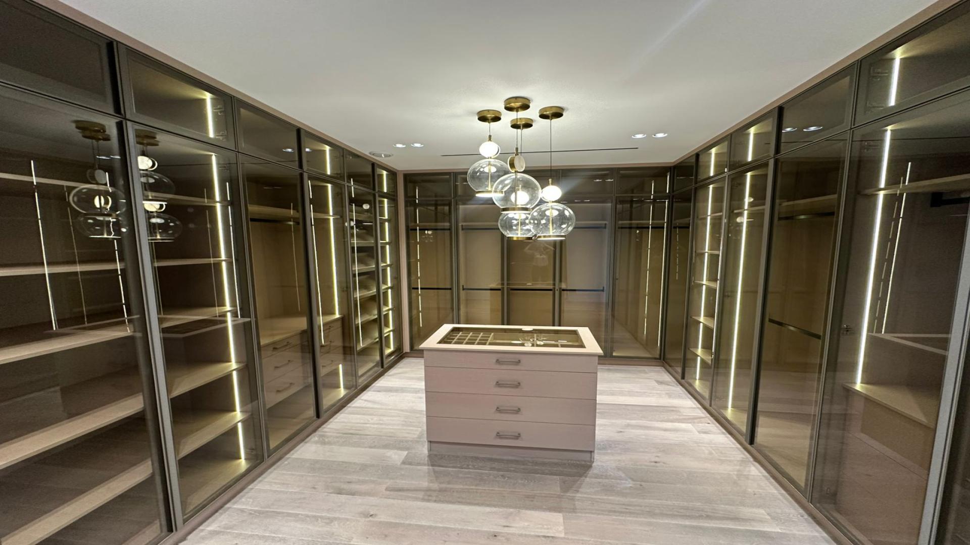 Luxury dining area in Jumeirah Golf Estates villa with modern decor and elegant lighting