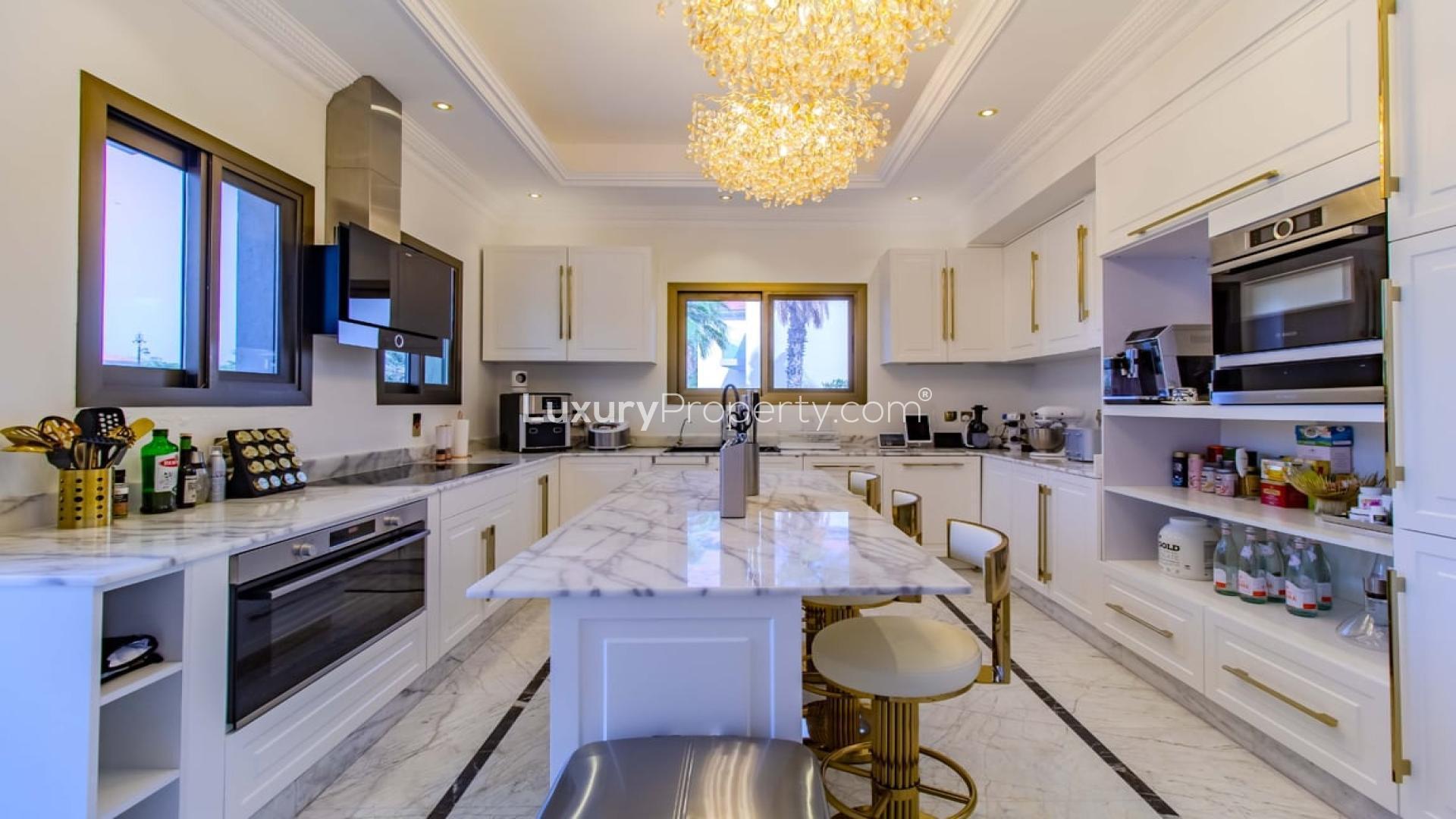 Luxurious living room in renovated Jumeirah Islands villa with elegant decor and spacious layout