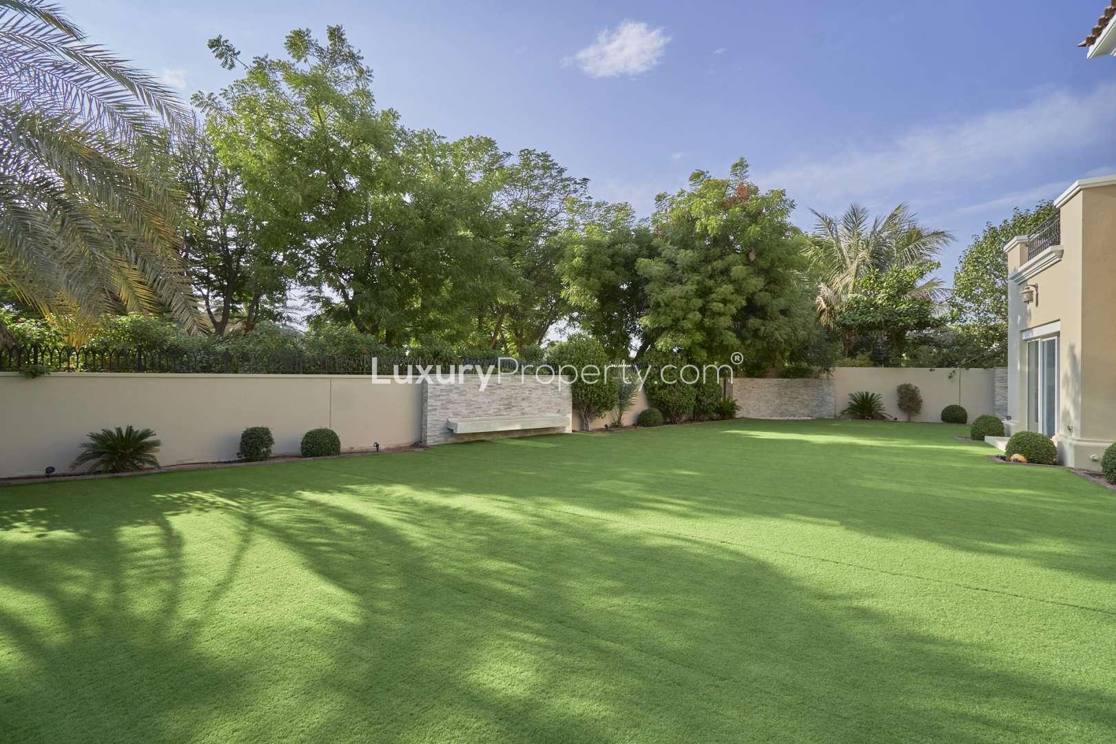 Modern bedroom in 4-bedroom Alvorada villa, Arabian Ranches, featuring wooden flooring and stylish decor