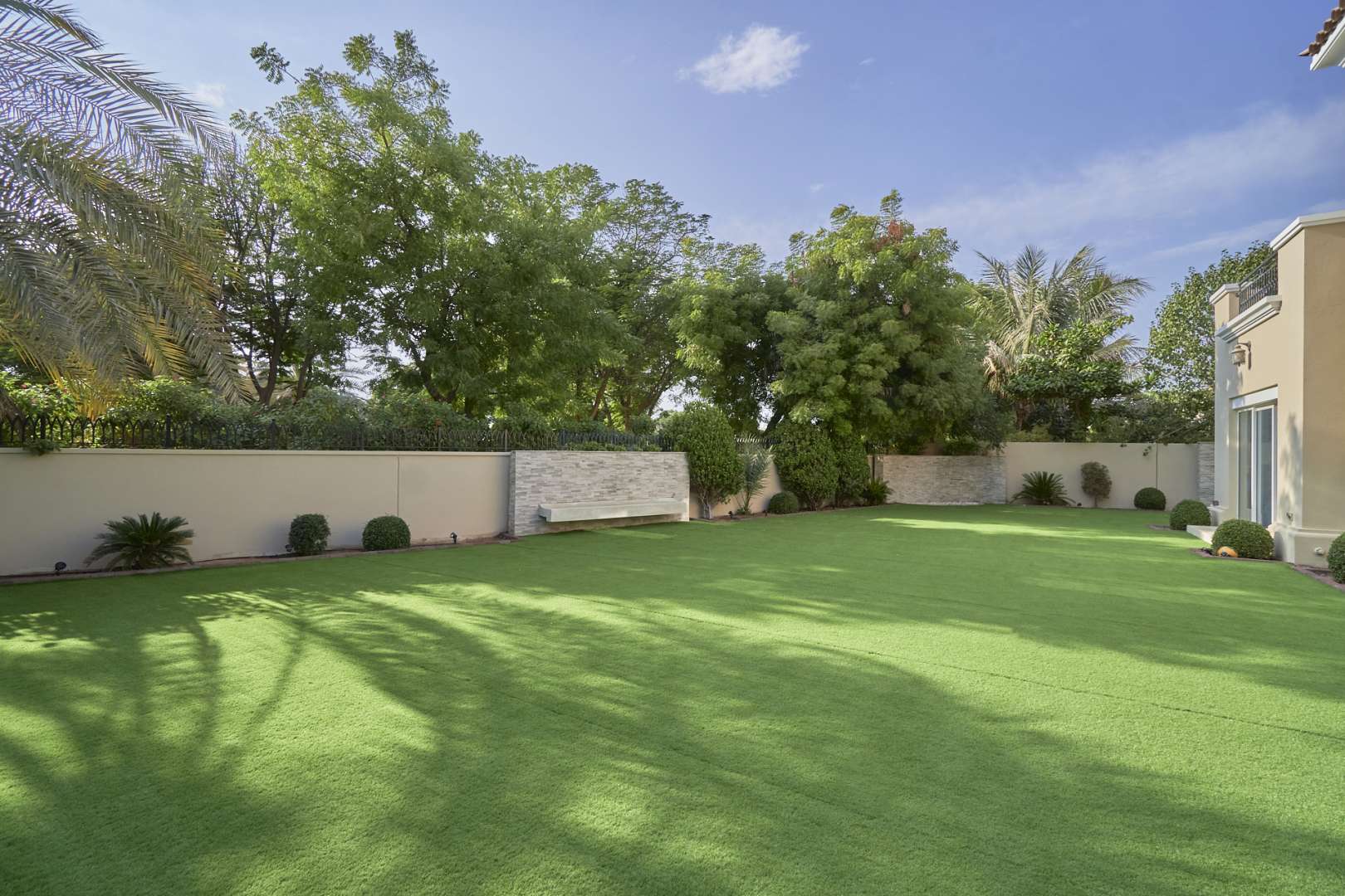 Modern bedroom in 4-bedroom Alvorada villa, Arabian Ranches, featuring wooden flooring and stylish decor