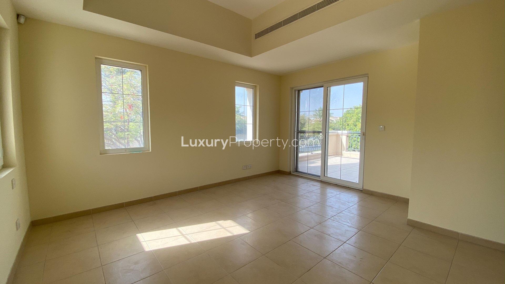Empty room with large windows in Alvorada villa, Arabian Ranches, for sale