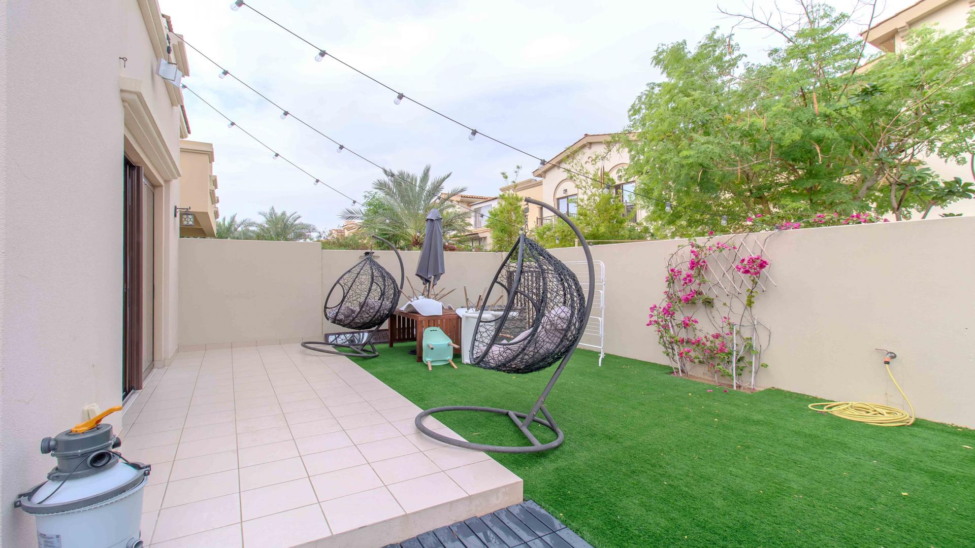 Living room in four-bedroom villa, Mira Community, Reem, featuring modern decor and play area