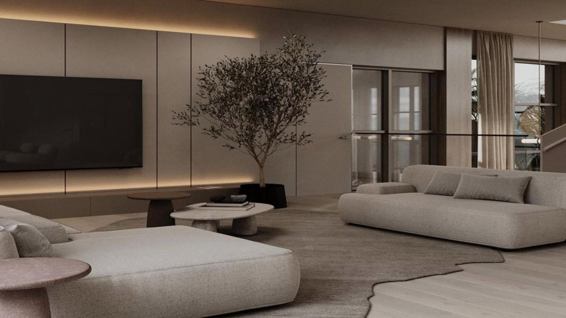 Luxurious living room with modern decor in Jumeirah Islands villa, featuring elegant furnishings