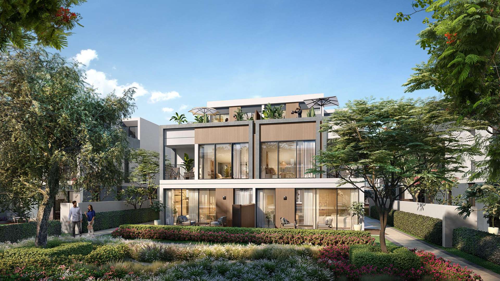 Modern 4-bedroom villa in Aura, Tilal Al Ghaf, surrounded by lush greenery and luxury cars