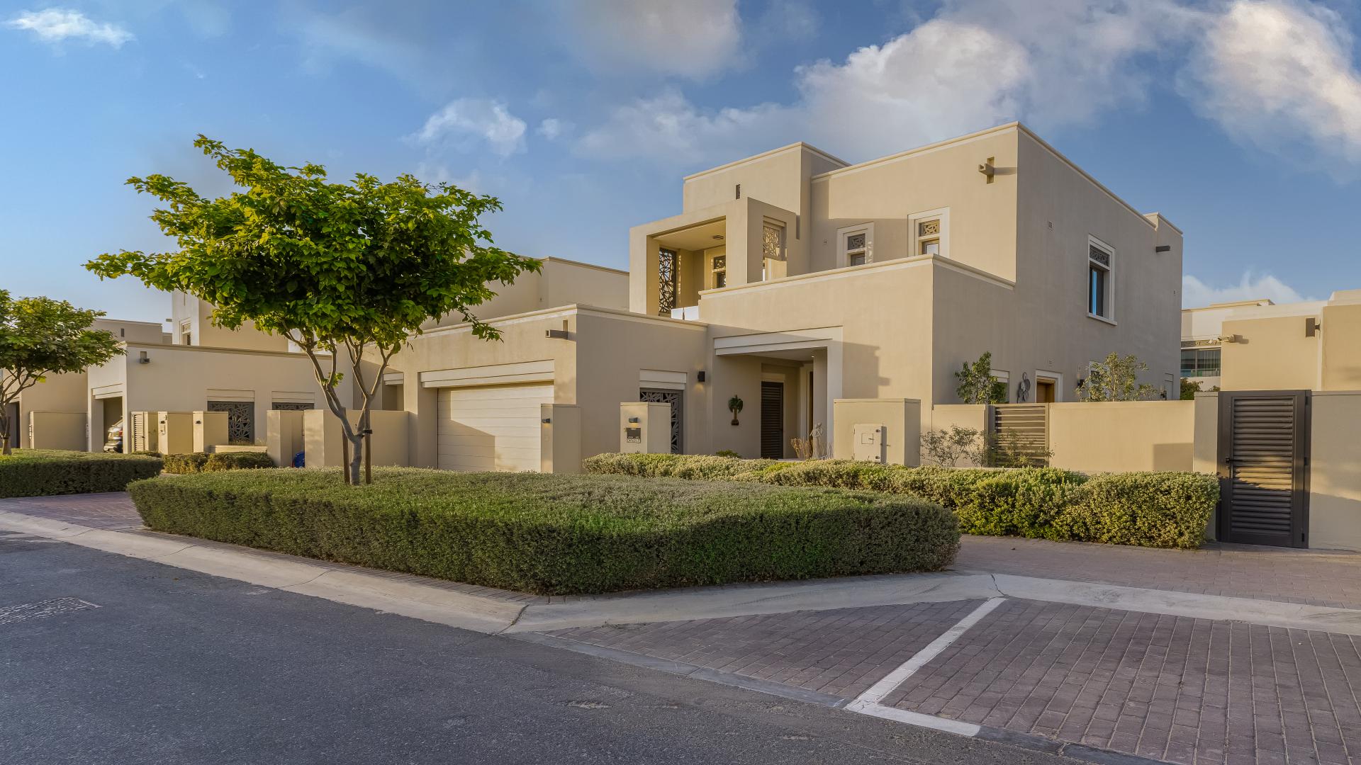 Fully upgraded furnished villa exterior in Azalea, Arabian Ranches 2, lush garden view