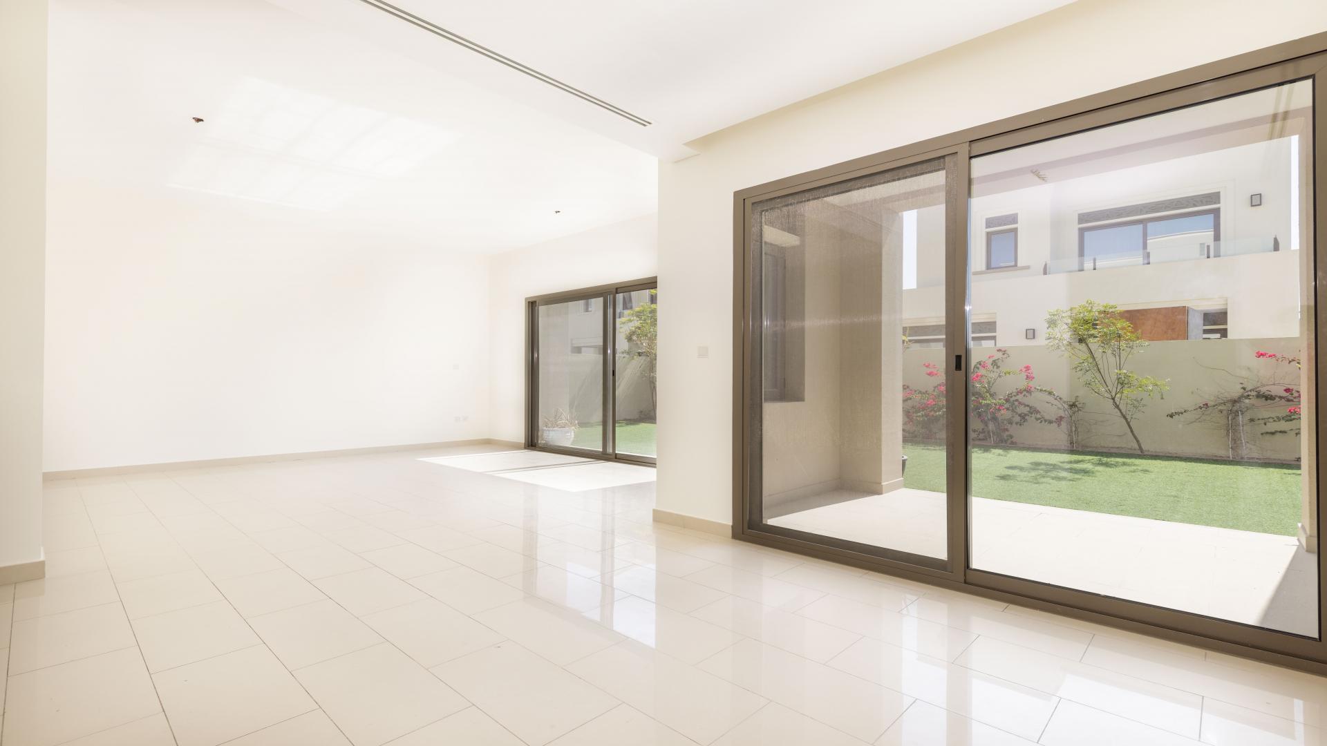 Spacious living area with large windows in Azalea villa, Arabian Ranches 2, for sale