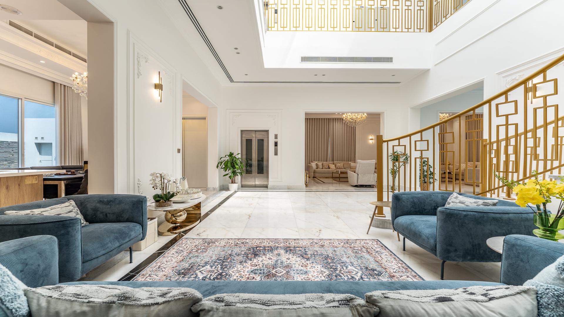Luxurious villa interior with marble floors and elegant staircase in Pearl Jumeirah, Jumeirah