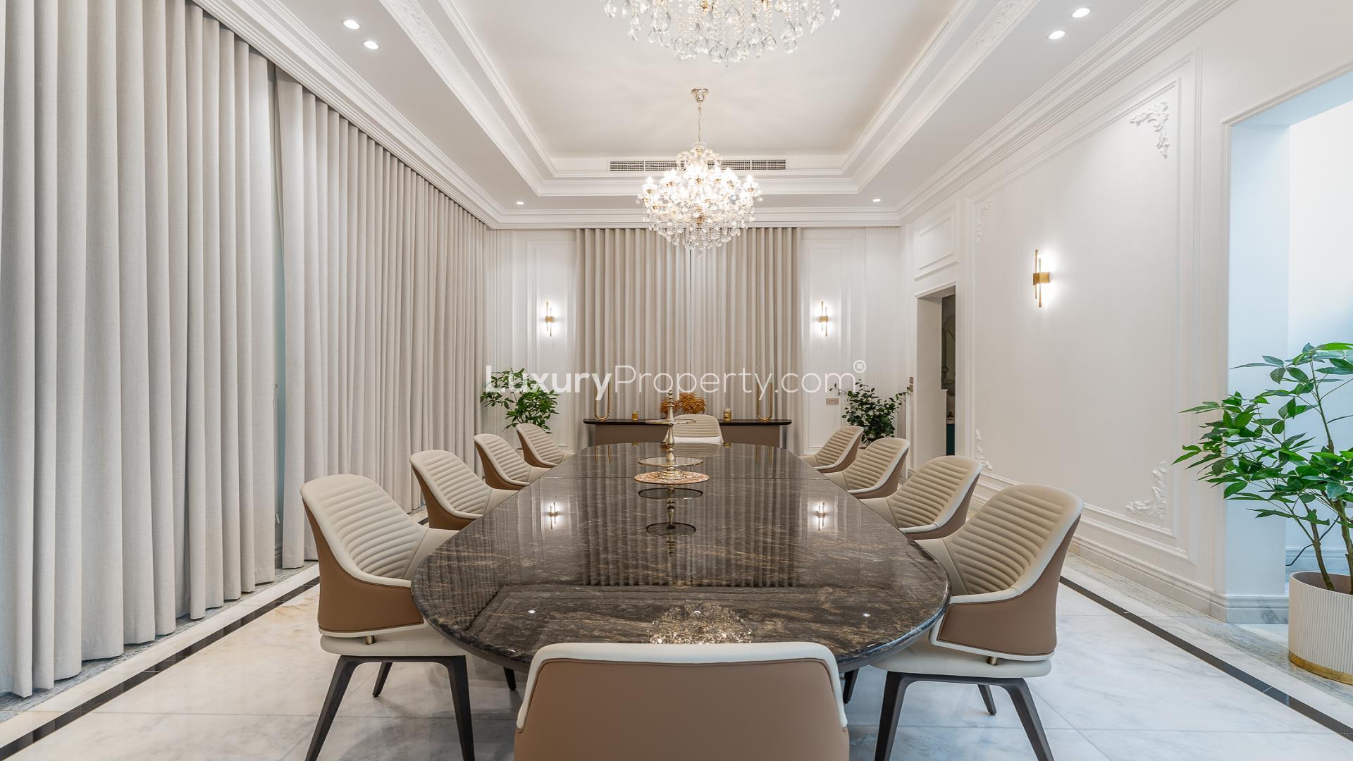 Luxurious living room in Pearl Jumeirah villa for sale, featuring elegant decor and spacious design