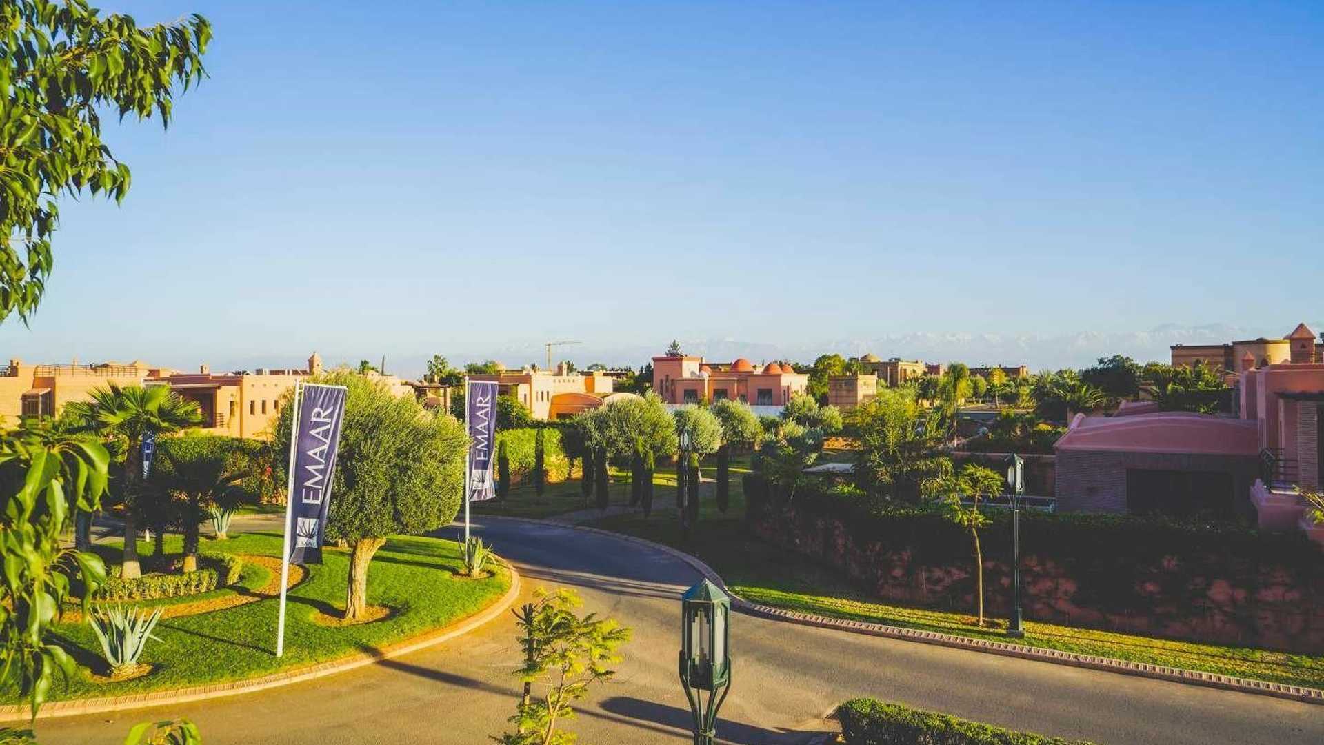 Ultramodern 4-bedroom villa in Amelkis Resort, Marrakech, with lush gardens and scenic views