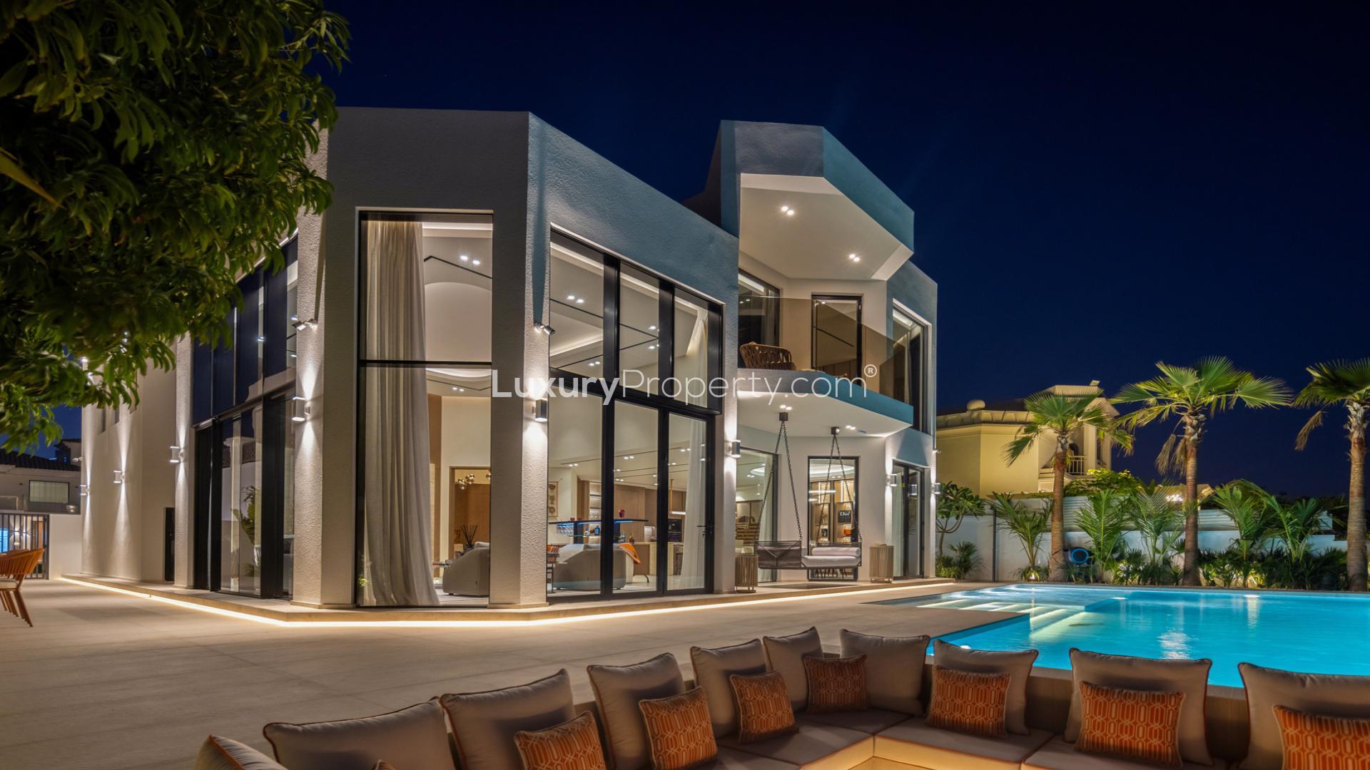 Modern 4-bedroom villa for sale on Palm Jumeirah, featuring sleek architecture and lush landscaping
