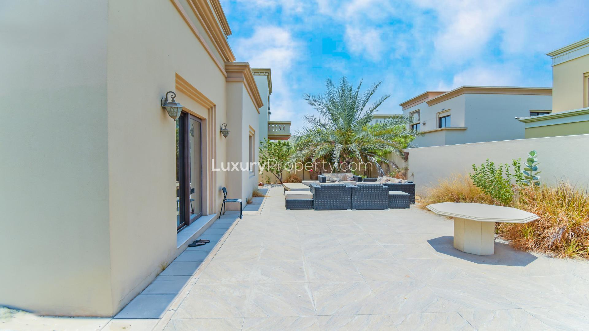 Front view of 4-bedroom villa with garage in Casa, Arabian Ranches 2